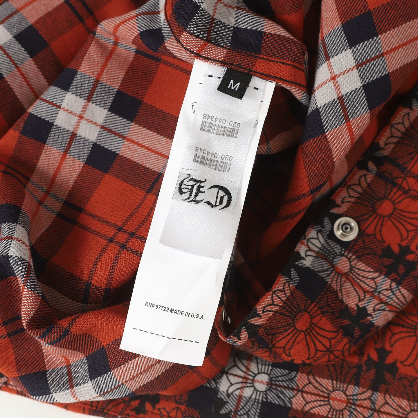 Red and black long-sleeve plaid shirt with button front and size tag
