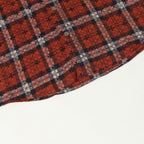 Long-sleeve shirt hem with red floral plaid pattern and dark check sections