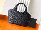 Black quilted leather tote bag with structured top handles and front logo
