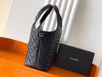 Black quilted leather tote bag with top handles and small front emblem