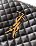 Black quilted leather panel with gold YSL emblem detail