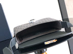 Crossbody bag open interior view, dark gray lining with small clasp hardware