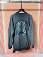 Dark teal long-sleeve sweatshirt with large back graphic emblem