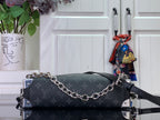 Dark monogram handbag with chain strap and silver-tone hardware, side view