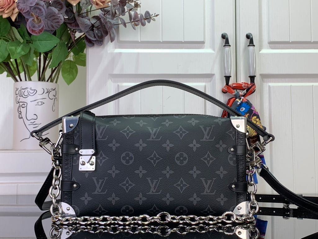 Dark monogram shoulder bag with chain strap and silver-tone hardware, front view