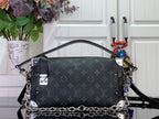 Dark monogram shoulder bag with chain strap and silver-tone hardware, front view