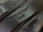 Black leather strap with embossed “LOUIS VUITTON PARIS” text