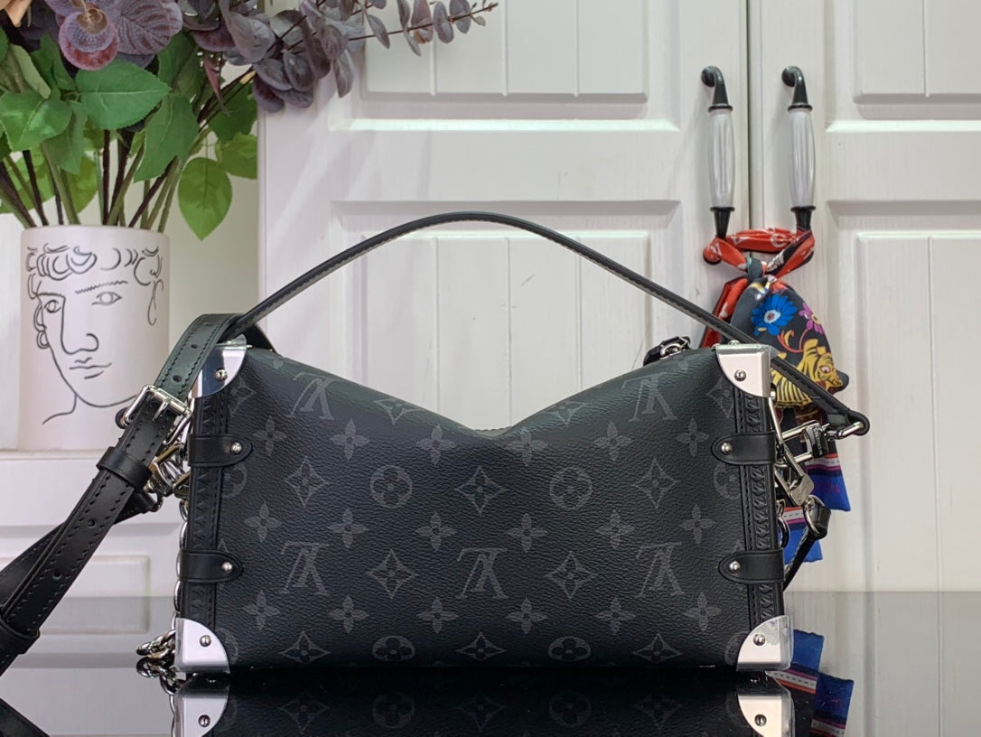 Dark monogram shoulder bag with chain strap and silver-tone metal corner plates
