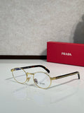 Prada eyeglasses with round clear lenses, gold frame and dark temples