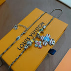 Silver-tone charm necklace with multicolor character charms and star pendant