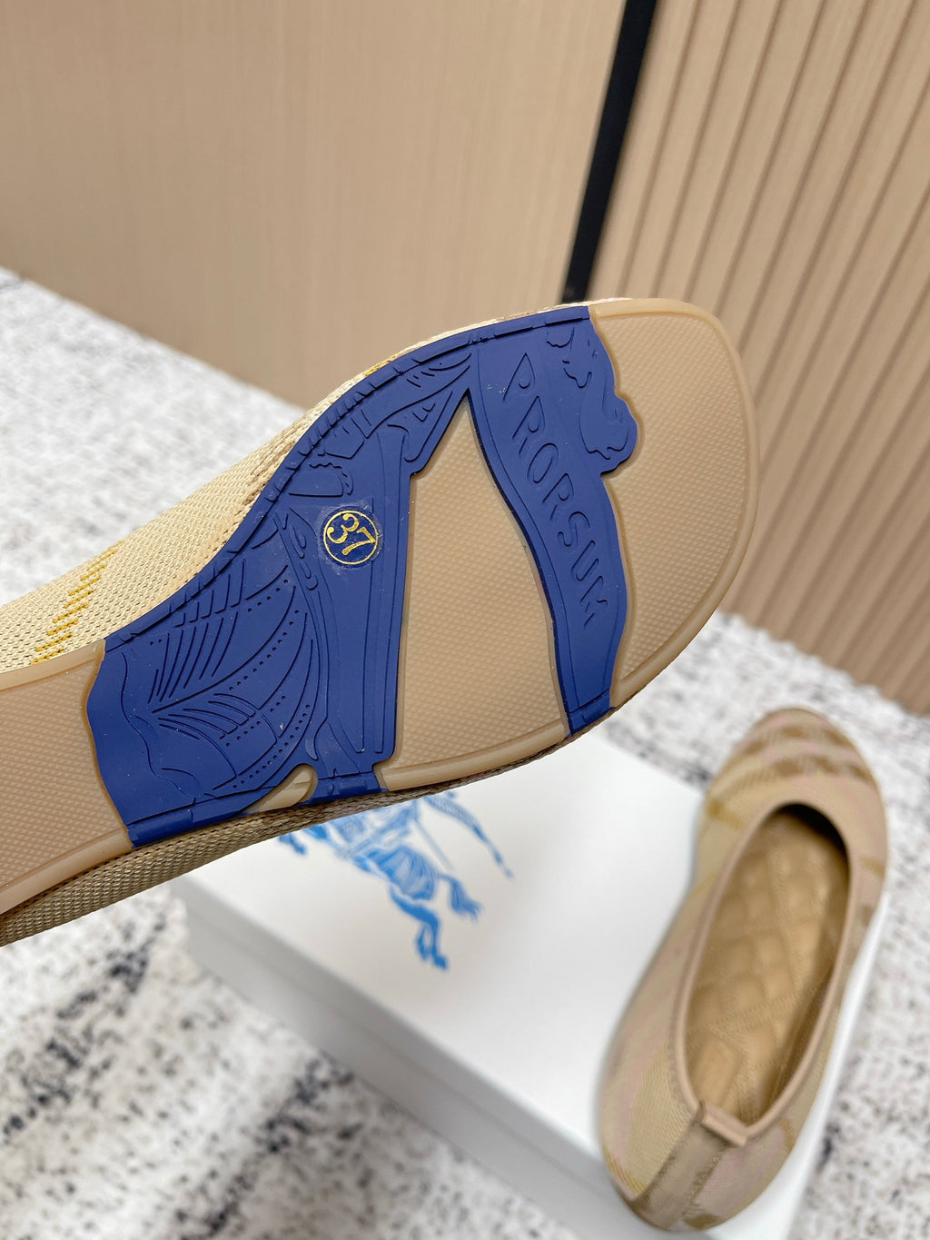 Burberry check-pattern slip-on flats, blue logo outsole detail