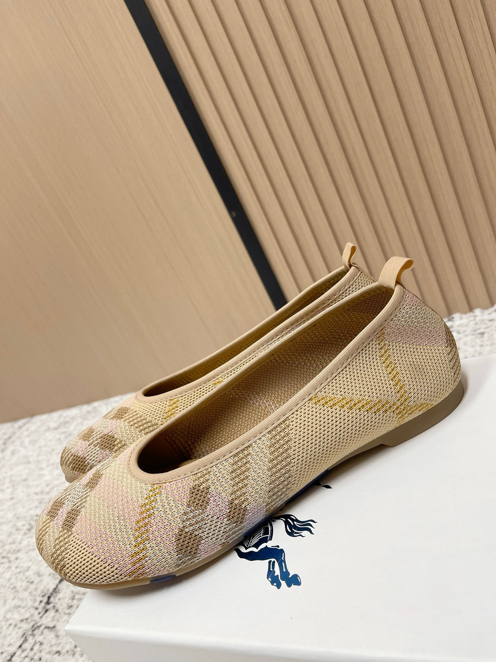 Burberry check-pattern slip-on flats, angled side view with low profile