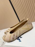 Burberry check-pattern slip-on flats, angled side view with low profile