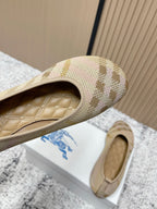 Burberry check-pattern slip-on flats, close-up toe opening and interior