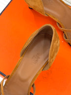 Tan suede sandal with open strap design and padded interior footbed