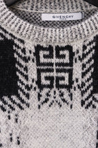 Givenchy knit sweater front close-up with black and white geometric motif on chest