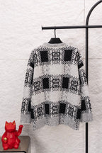 Givenchy knit sweater in black and white with geometric motifs, crew neck, long sleeves