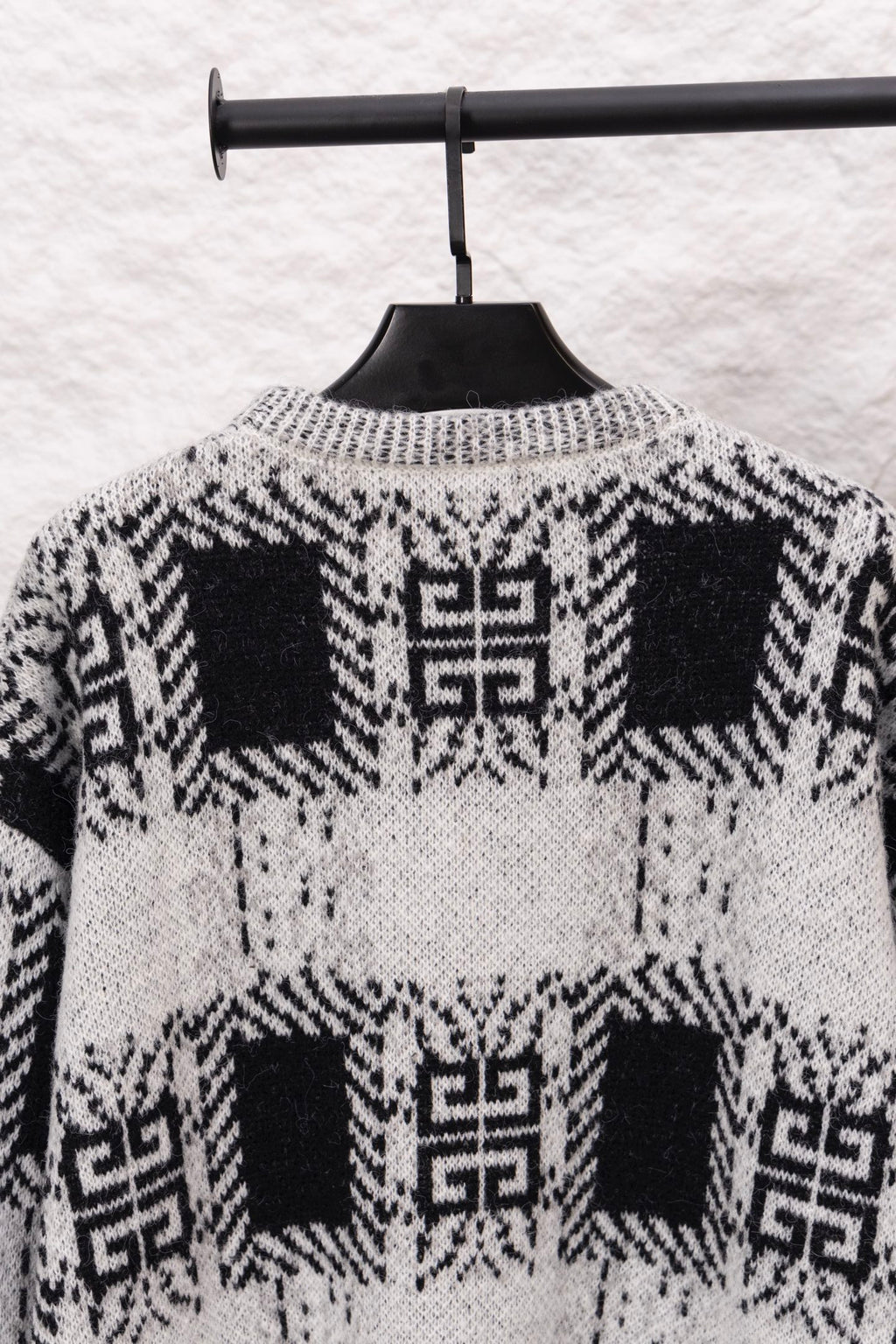Givenchy knit sweater back with black and white geometric motifs, crew neck, long sleeves