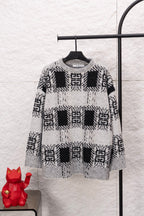 Givenchy knit sweater with black and white geometric pattern, crew neck, long sleeves