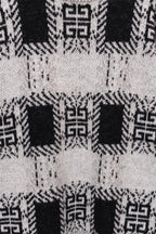 Givenchy knit sweater back pattern close-up in black and white geometric motifs