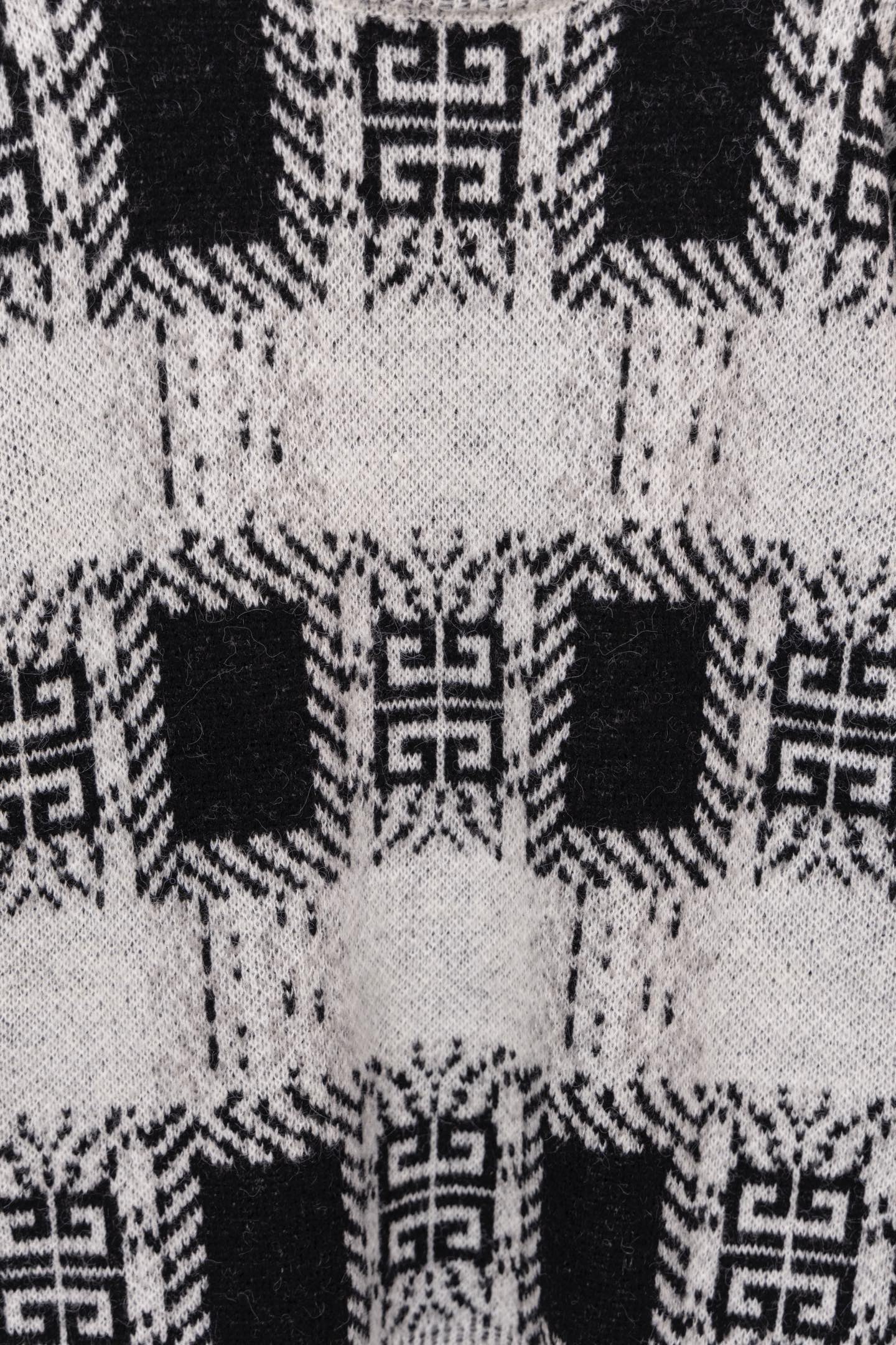 Givenchy knit sweater back pattern close-up in black and white geometric motifs
