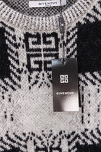 Givenchy knit sweater close-up with black and white geometric pattern and hanging tag