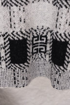 Givenchy knit sweater lower back close-up with black and white geometric pattern