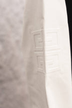 Givenchy white sleeve with subtle embossed logo detail