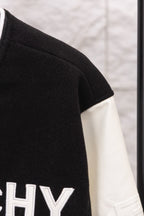 Givenchy black jacket shoulder with white sleeve panel and striped trim