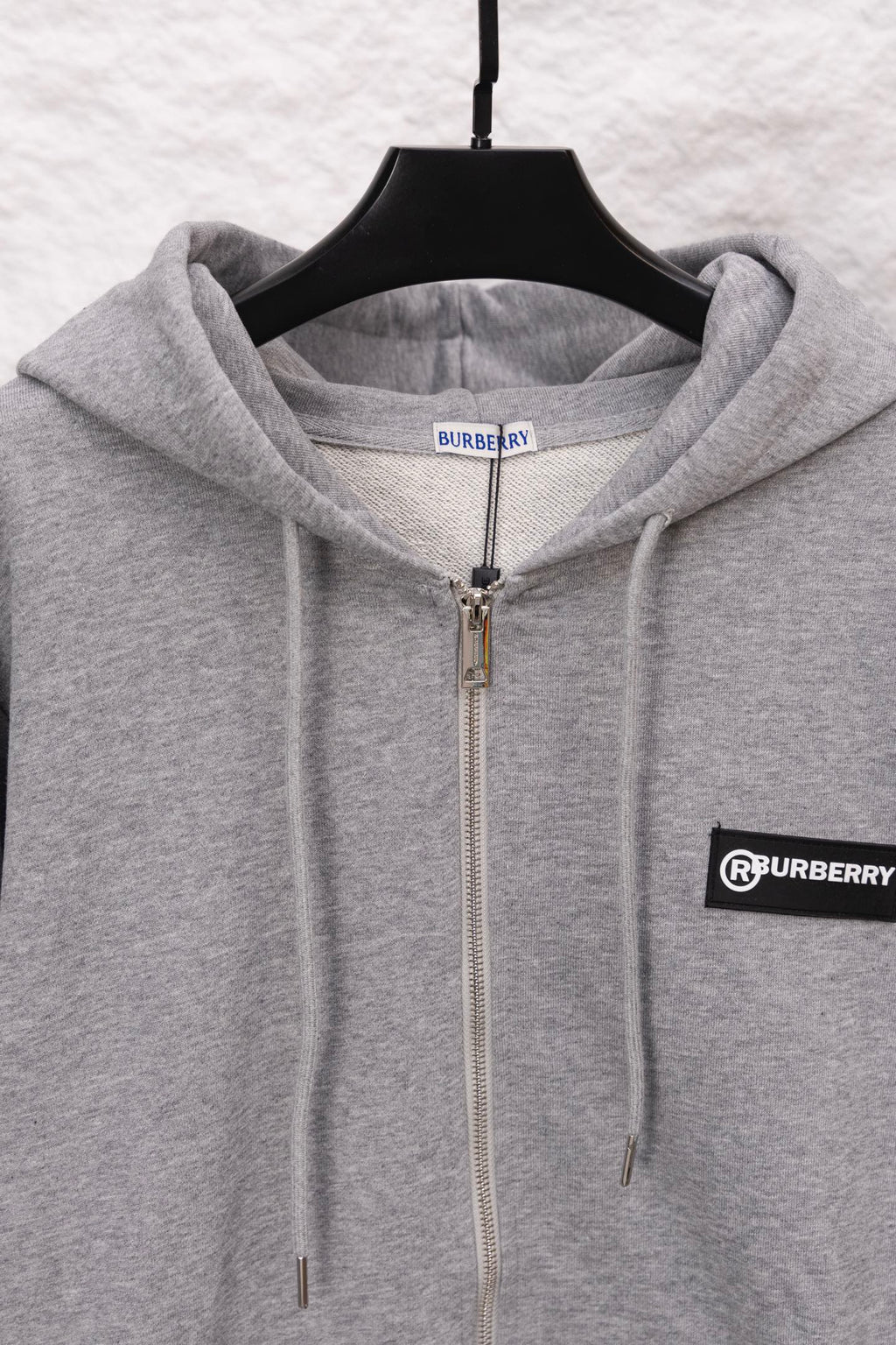 Burberry long zip-up hoodie heather gray with hood, front zipper, and drawcords