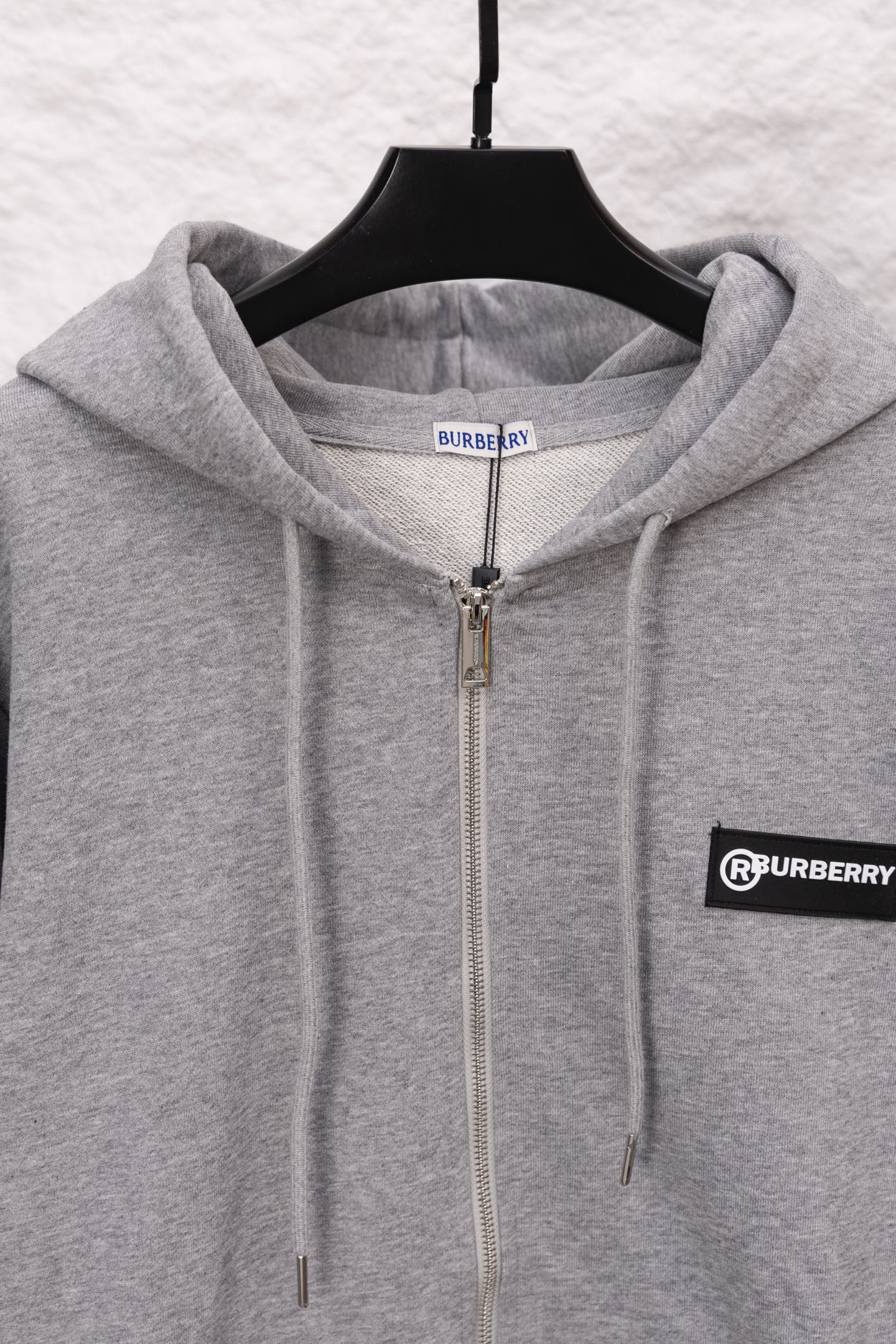 Burberry long zip-up hoodie heather gray with hood, front zipper, and drawcords