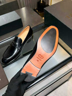 Black leather loafer with CD Dior logo on insole, orange sole underside