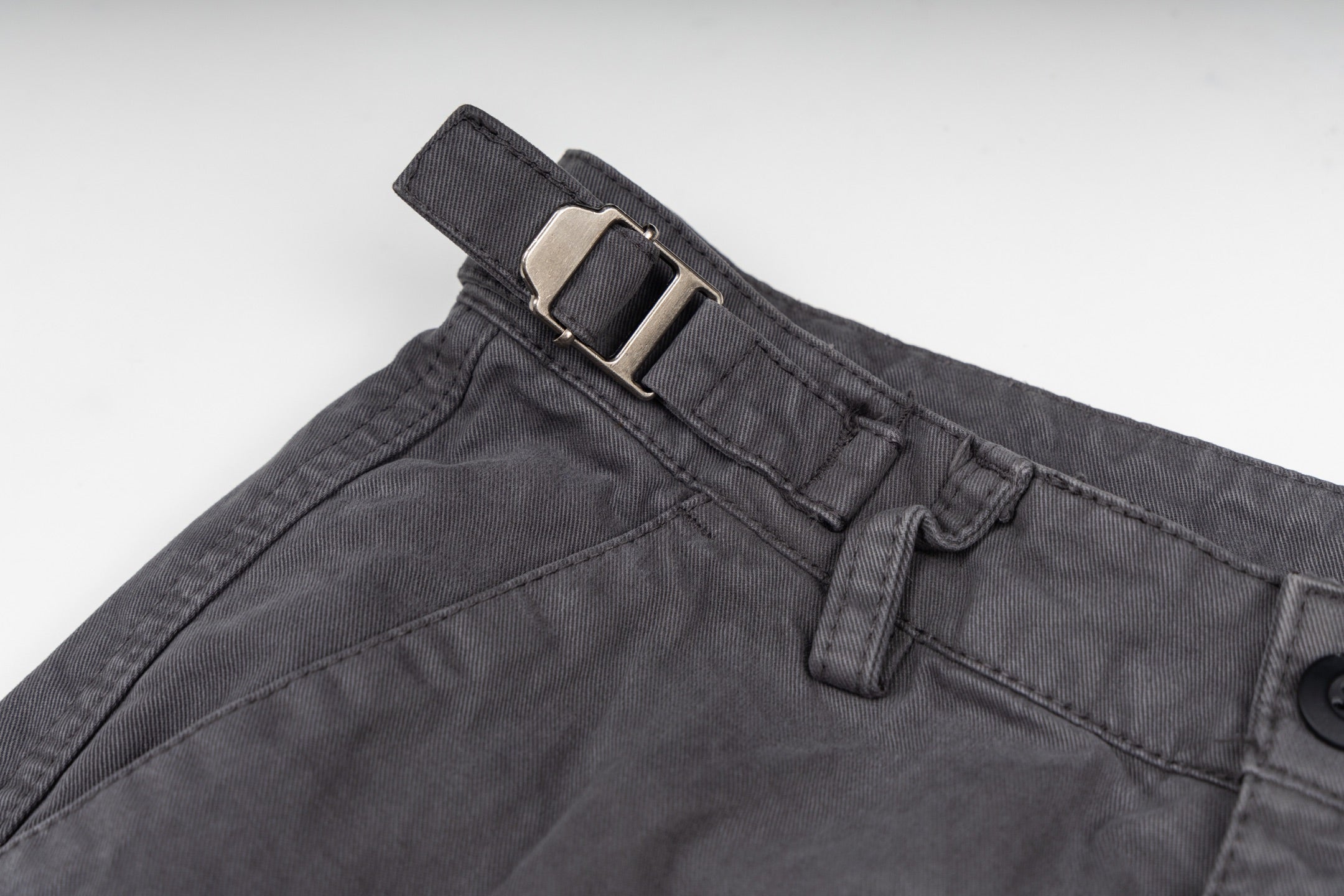Stone Island cargo pants waistband and belt loops, dark gray with metal buckle