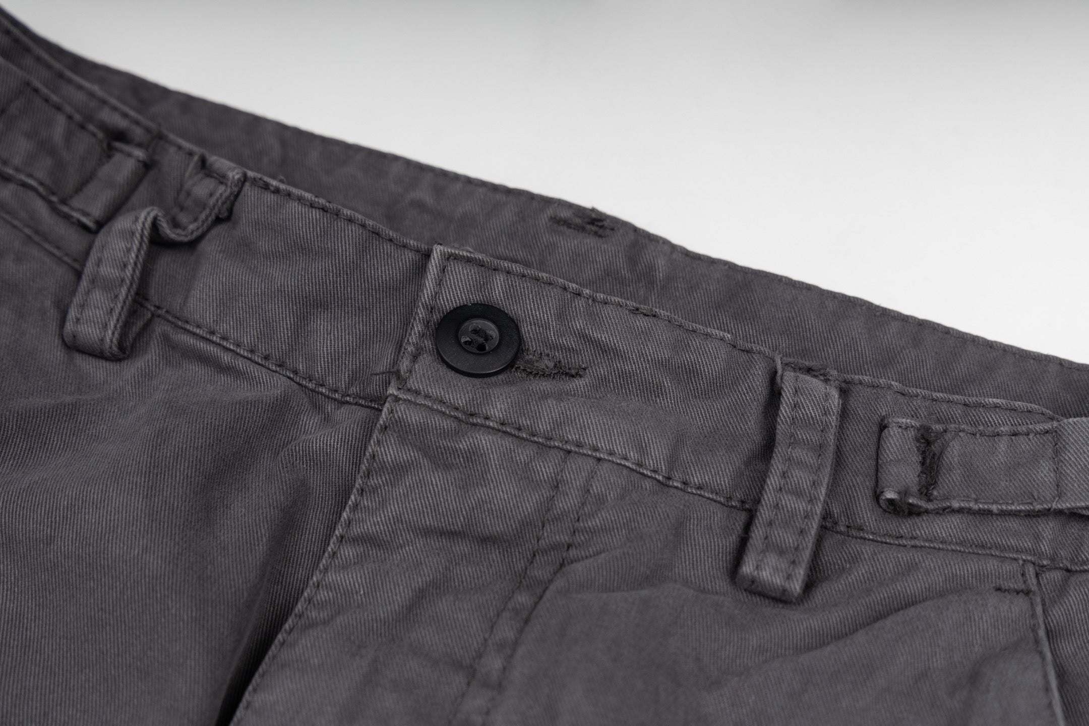 Stone Island cargo pants button closure and belt loops, dark gray