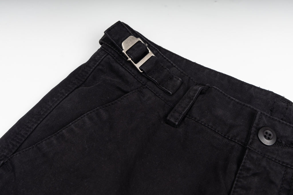 Black cargo trousers with metal buckle detail at waistband