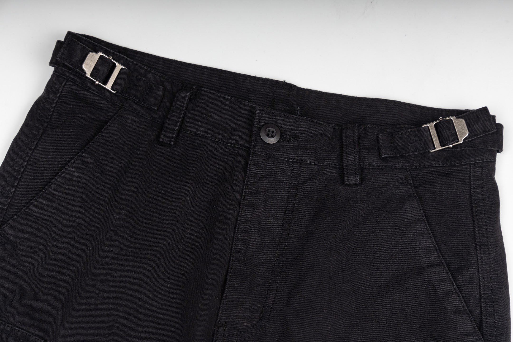 Black trousers with button closure and belt loops