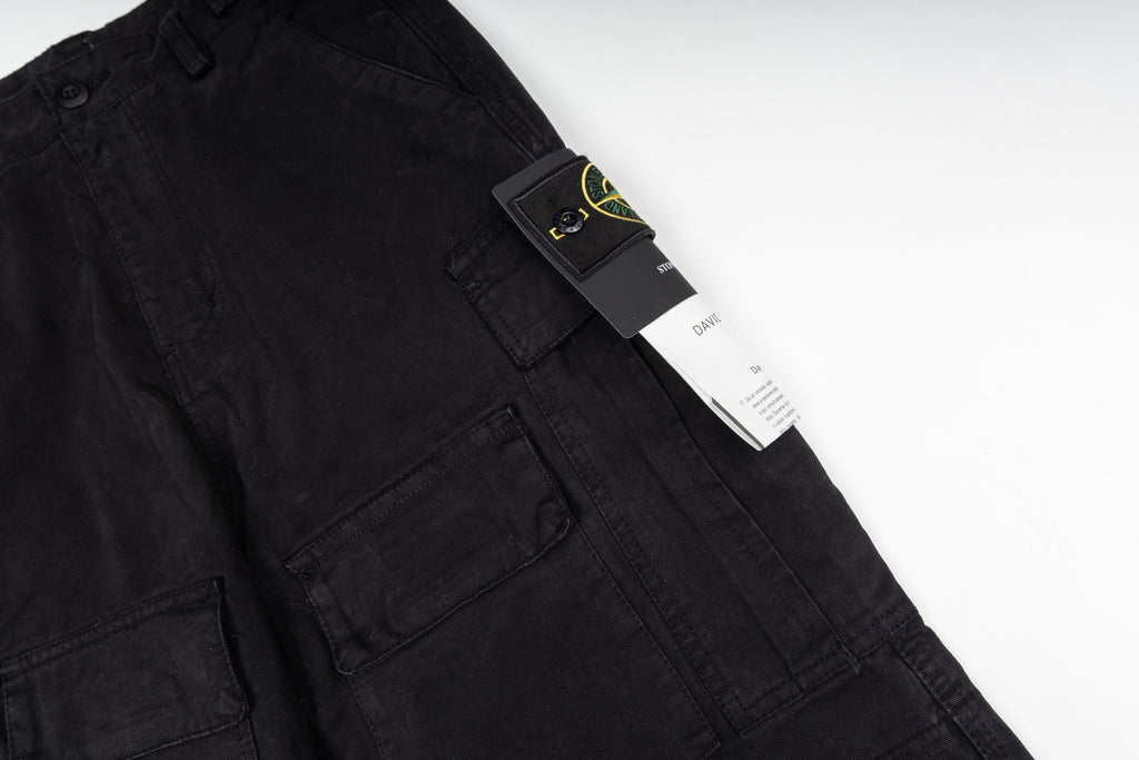 Black cargo trousers with brand tag on the pocket