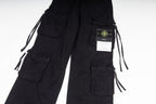 Stone Island cargo pants in black, close-up of cargo pockets and drawstring ties