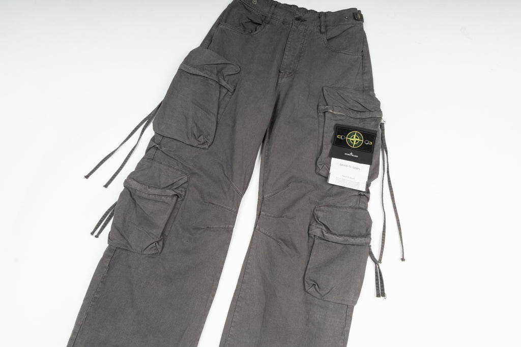 Stone Island cargo pants in charcoal, close-up of cargo pockets and label