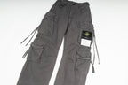 Stone Island cargo pants in charcoal, close-up of cargo pockets and label