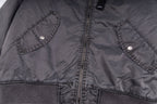 Dark gray bomber jacket with two snap-flap chest pockets and central zipper