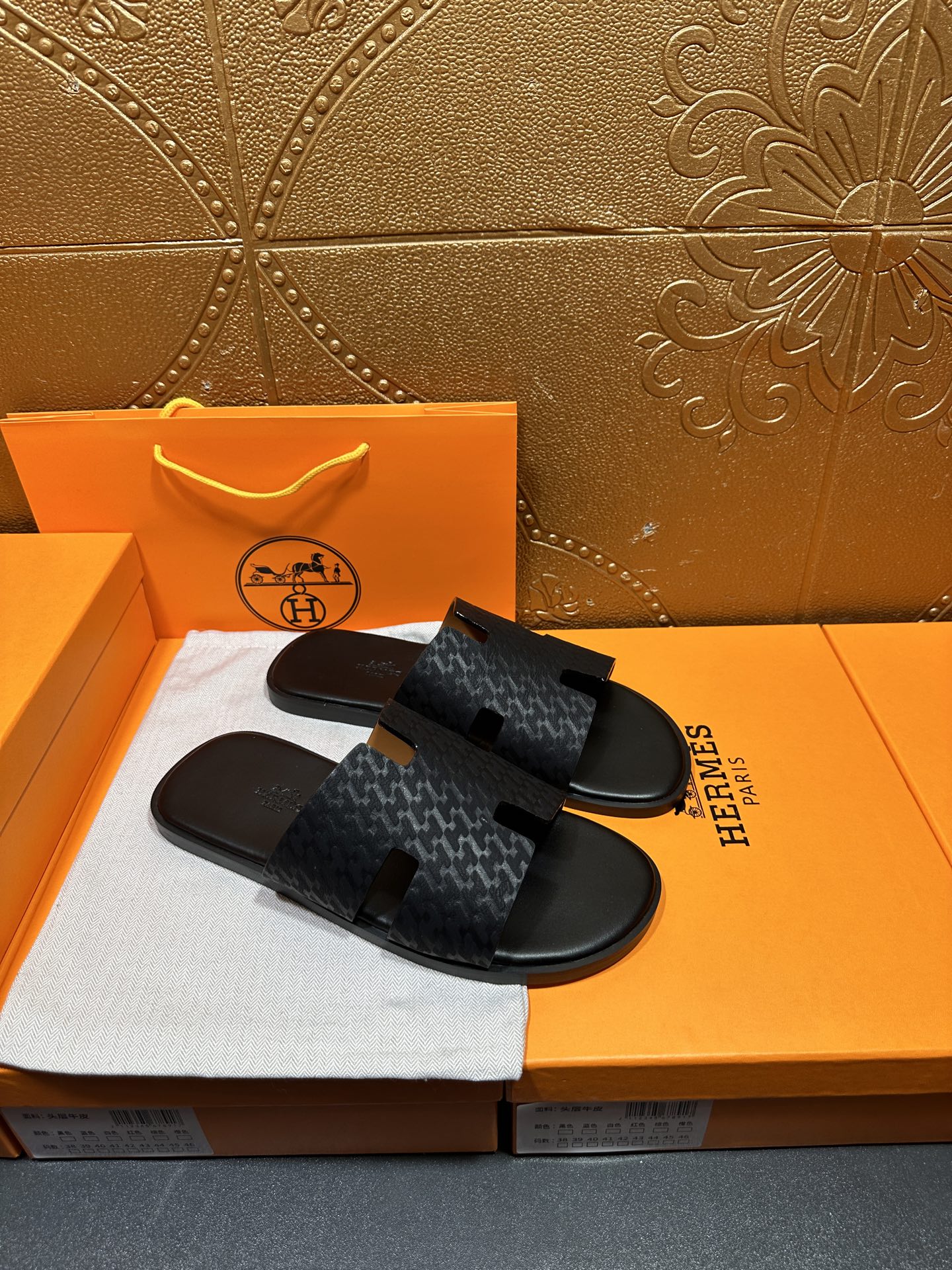 Hermes slide sandals, dark gray textured footbed and strap with H-style cutout