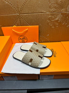 Hermes slide sandals, patterned upper straps with cutouts and white footbed