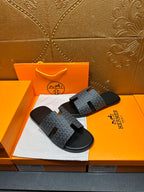 Hermes slide sandals in charcoal with patterned straps and black rubber footbeds