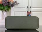 Olive green Louis Vuitton tote bag with diamond quilting on the front panel
