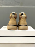 Beige sneakers back view with heel tab and chunky lug sole