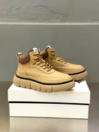 Beige lace-up sneakers with brown heel collar, chunky sole and G logo patch