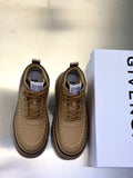 Beige leather sneakers with lace-up front and decorative stitching
