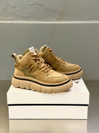Givenchy lace-up sneakers in tan suede, side view with thick sole