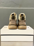 Givenchy sneakers heel view with beige back panels and lace-up ankle support